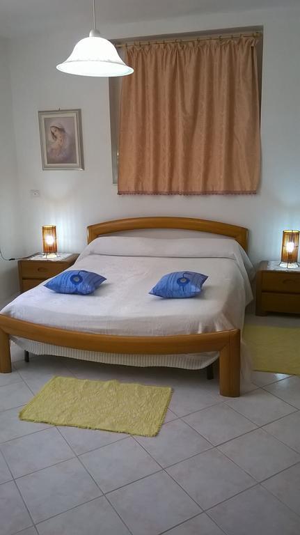 Sa Domu Sarda Casa Vacanza พิสซินาส ห้อง รูปภาพ
