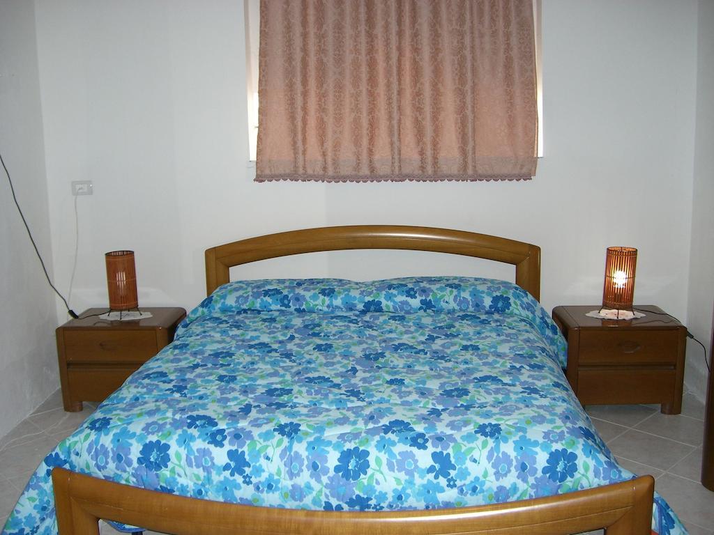 Sa Domu Sarda Casa Vacanza พิสซินาส ห้อง รูปภาพ