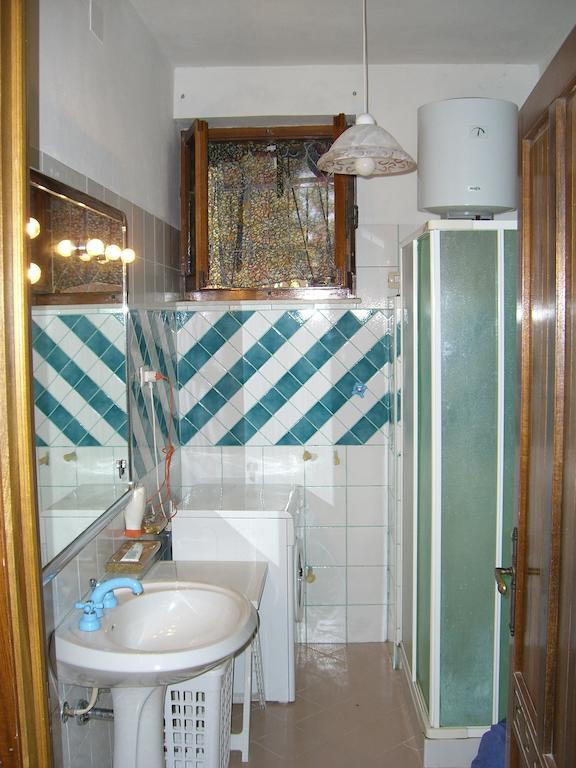 Sa Domu Sarda Casa Vacanza พิสซินาส ห้อง รูปภาพ